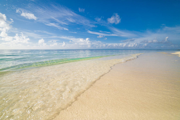 Sea sand sky. Sea view, top view, amazing nature background. Azure beach clear water of ocean at sunny day - Photo, Image