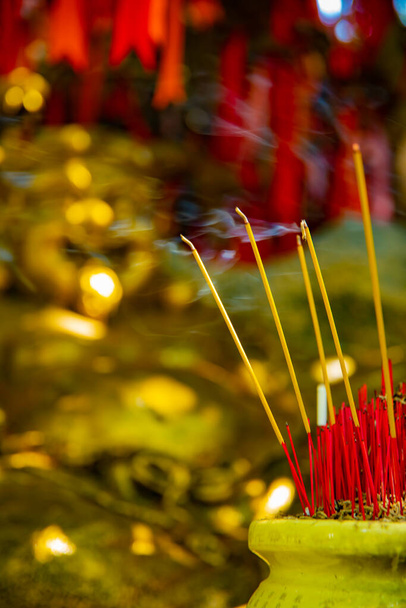 An incense stick at Suoi Tien park in Ho Chi Minh Vietnam closeup - Photo, Image