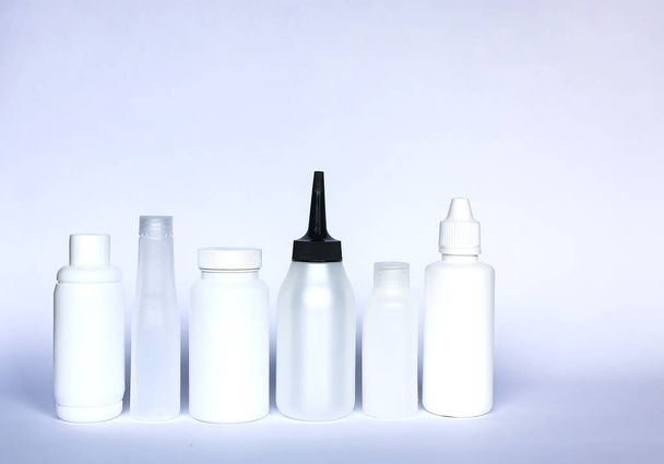 Group of product packaging plastic light containers. - Foto, imagen