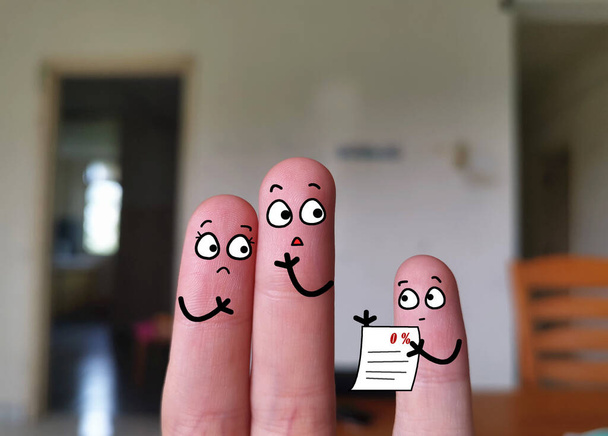 Three fingers are decorated as three person. Parents are shocked and angry when they found out their kid failed the exam. - 写真・画像