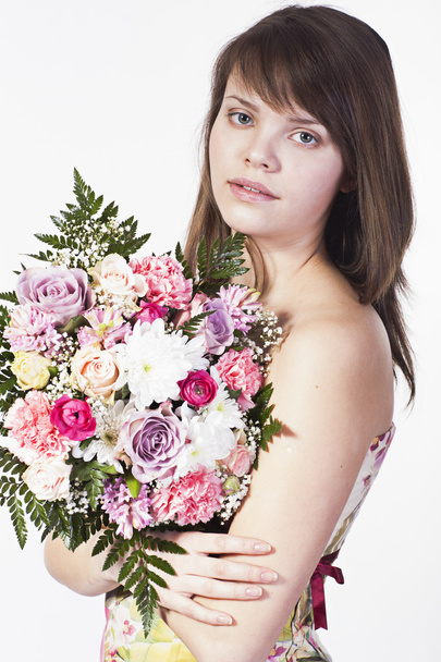 young woman with bouquet - Fotografie, Obrázek