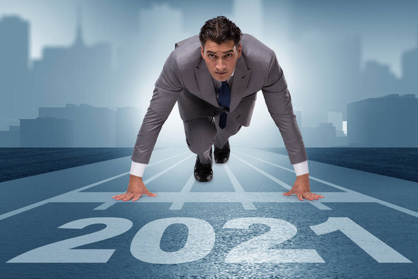Businessman on finish line to year 2021 - Photo, Image