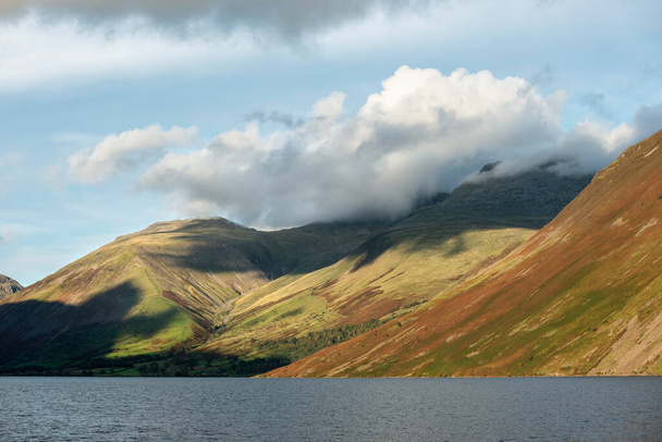 Stunning late Summer landscape image of Wasdale Valley in Lake District, looking towards Scafell Pike, Great Gable and Kirk Fell mountain range - Photo, Image