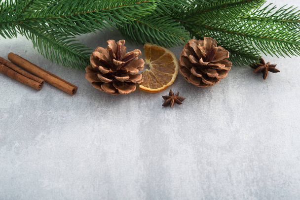 Decor wooden fir tree with branches on a stone background. Concept of Merry Christmas holiday. - Fotoğraf, Görsel