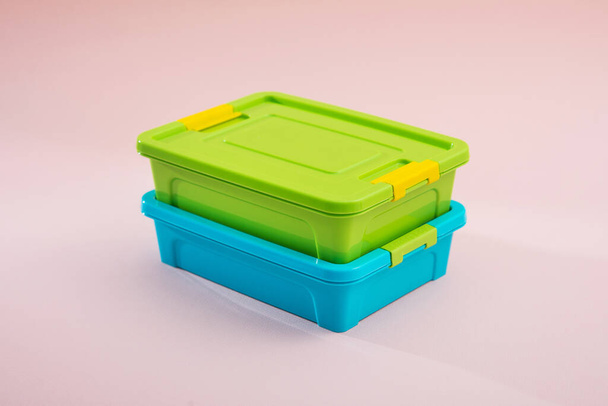 Plastic container box on a pastel color background - Photo, Image