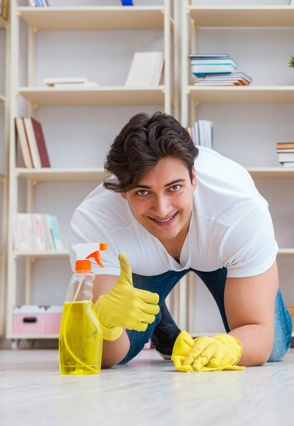 Man doing cleaning at home - Fotó, kép