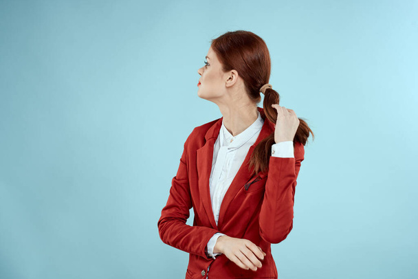 Elegant woman in red jacket bright makeup lips self-confidence cropped view blue background - Foto, Imagem