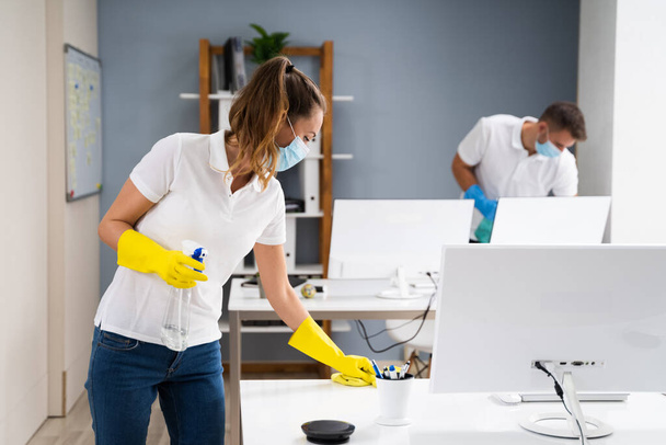 Professional Office Cleaning Services With Face Masks - Photo, Image