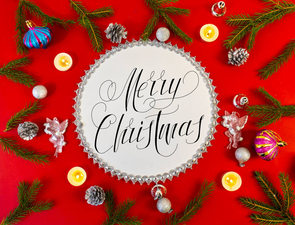 Christmas card, banner, flatlay with text - Merry Christmas on a red background - Fotoğraf, Görsel
