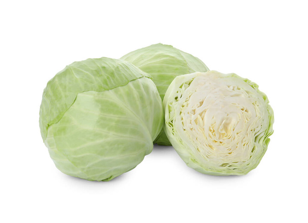 Whole and cut fresh ripe cabbages on white background - Foto, Imagen