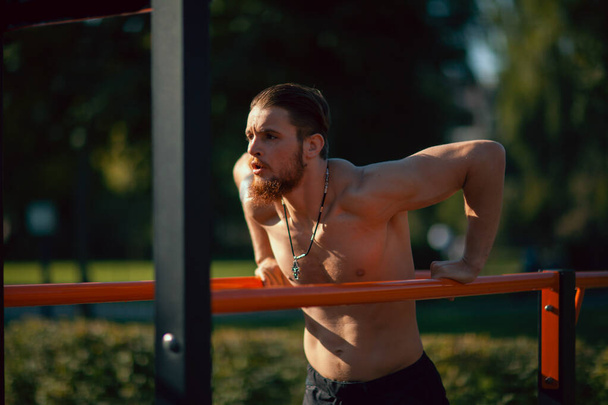 Athletic young man maker workout in morning - Foto, Imagem
