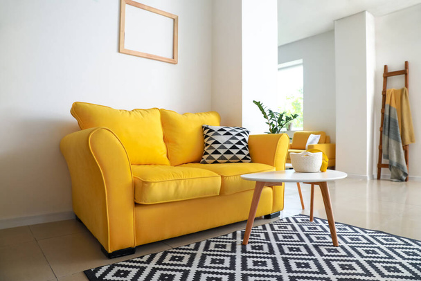 Interior of modern studio apartment with comfortable sofa - Photo, Image