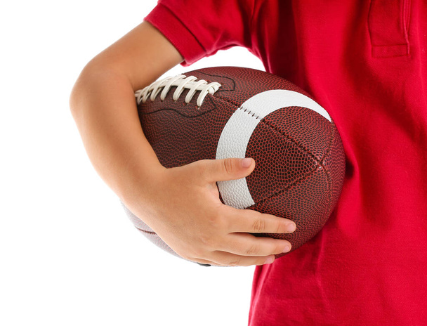 Little boy with rugby ball on white background, closeup - Photo, Image