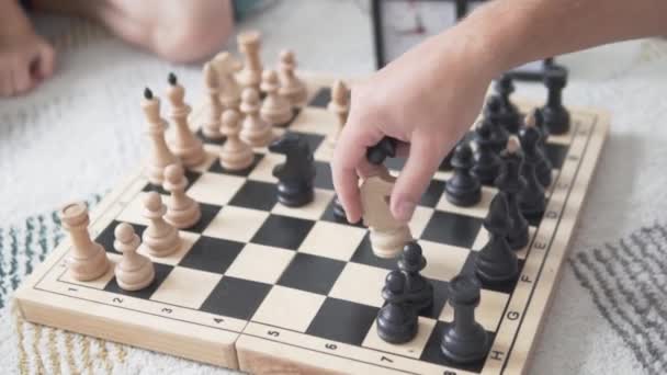 Dad and son play chess at home. - Footage, Video