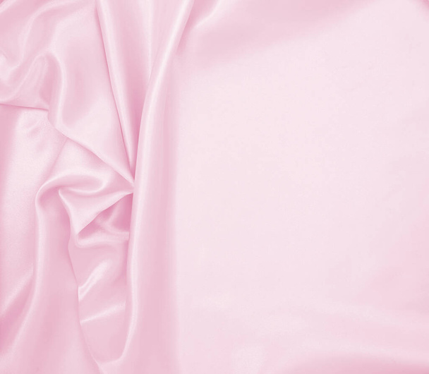 Smooth elegant pink silk or satin texture can use as wedding background. Luxurious background design - Photo, image