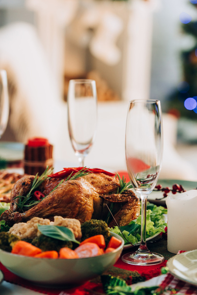 selective focus of table served with delicious turkey and vegetables for thanksgiving dinner - 写真・画像
