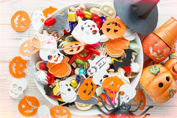 Halloween Jack o Lantern candy bowl with candy and halloween cookies Trick or Treat  card - Fotó, kép