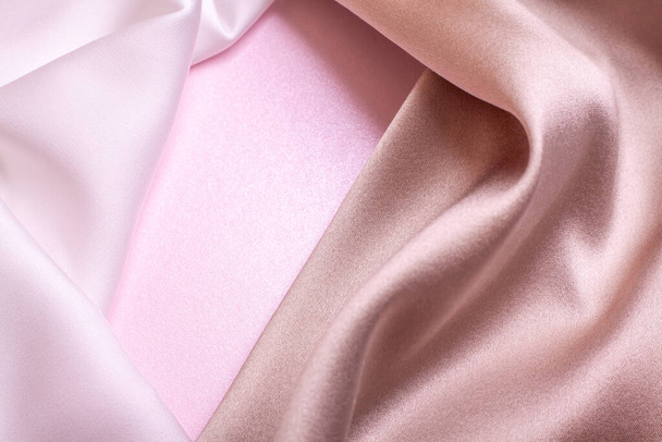 Abstract background in soft colors of silk fabrics on pink pearl paper. Beautiful trend texture. - Foto, Imagem