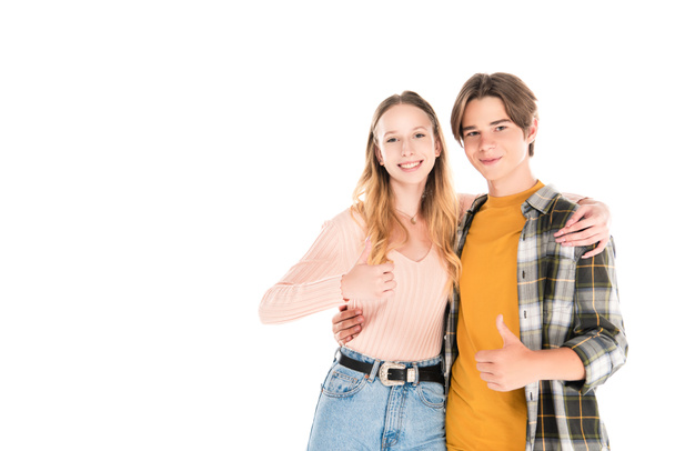 Smiling teenagers embracing and showing like isolated on white - Фото, зображення