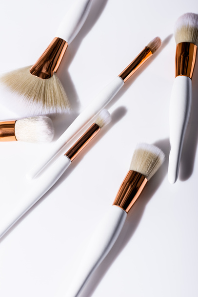 top view of cosmetic brushes set on white background - Fotografie, Obrázek