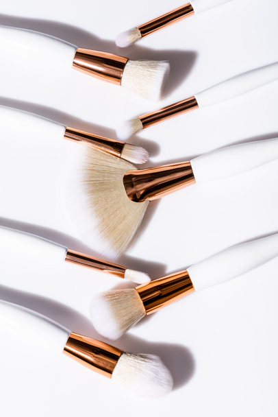 top view of cosmetic brushes set on white background - Fotografie, Obrázek