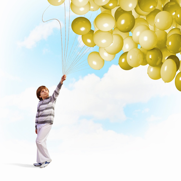 Cute boy with balloons - Foto, imagen