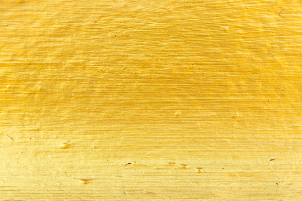 Closed up of metallic gold cement textured background - Fotó, kép