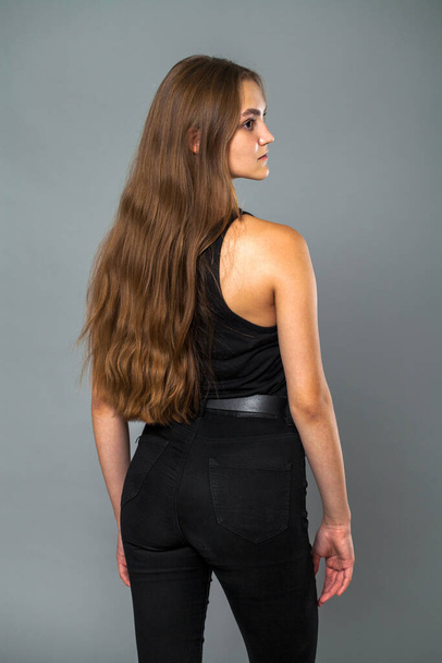 Back rear view brunette hair model, indoor - Foto, Bild
