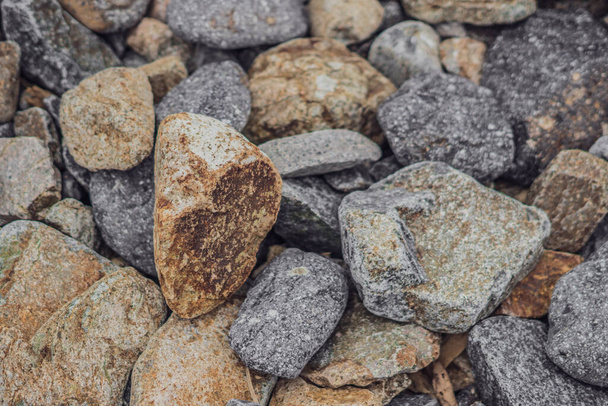 Small and big smooth round pebbles, sea dry stones, multicolour gray gravel. Abstract Composition Textured background. Ideal for web banner design - Photo, Image