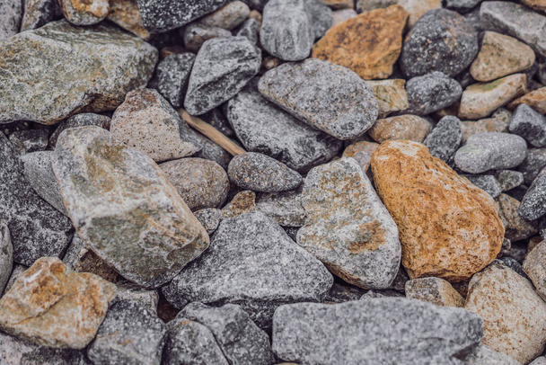 Small and big smooth round pebbles, sea dry stones, multicolour gray gravel. Abstract Composition Textured background. Ideal for web banner design - Photo, Image