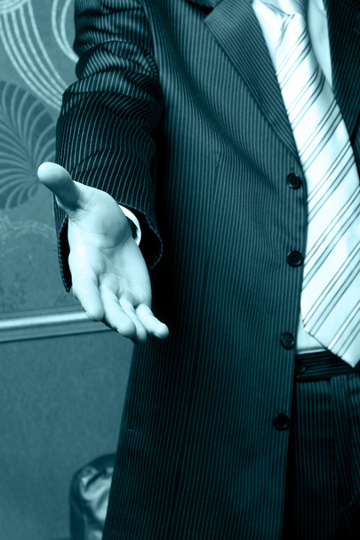 businessman giving his hand for a handshake - 写真・画像