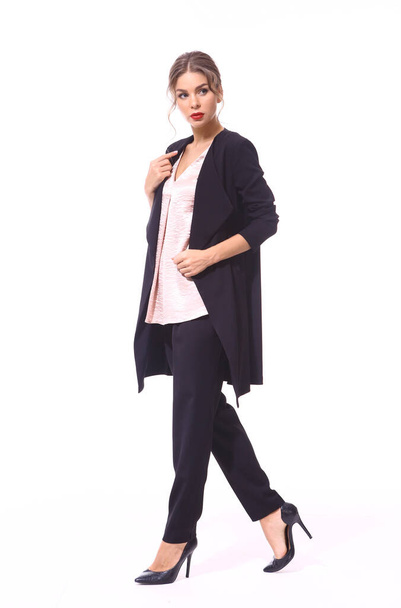 business lady walking in official formal clothes pant suit high heels shoes full body photo - Фото, изображение