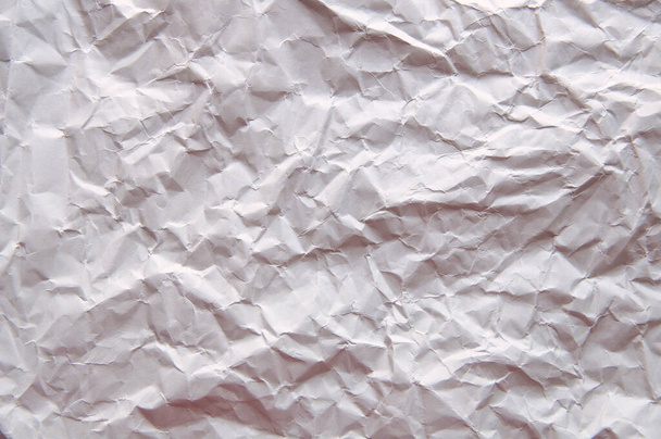 gray background of crumpled paper fills the entire sheet - Photo, Image