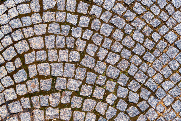 gray cobblestones sloppy arranged in a curve pattern - Photo, Image