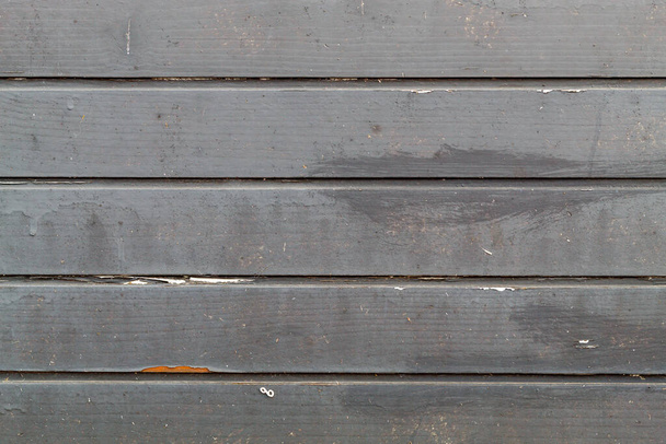 Viejos paneles de madera horizontales pintados negro envejecido - Foto, Imagen
