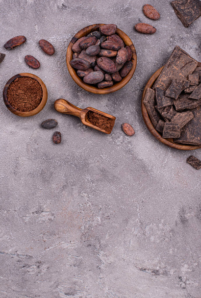 Natural cocoa powder, cocoa beans and chocolate - Foto, immagini