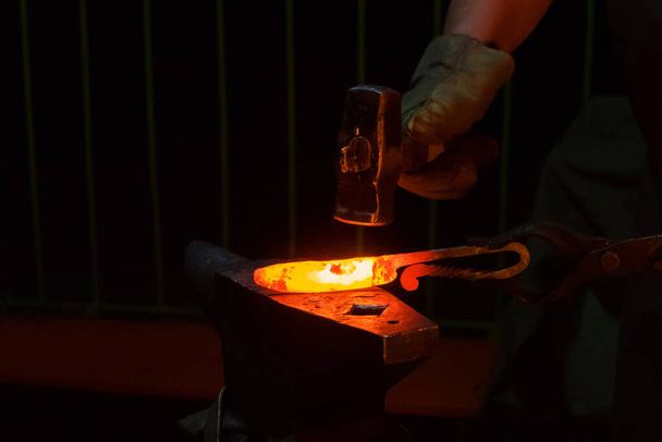 Blacksmith working with metal - Photo, Image