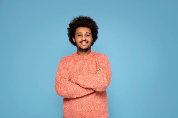 Handsome african american man with afro hair wearing casual clothes . - Photo, Image