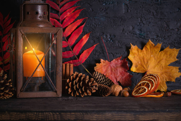 Autumn Thanksgiving   Background with lantern and autumn leaves. Winter holidays composition - 写真・画像