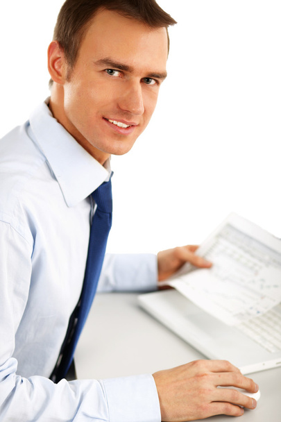 Young businessman using laptop - Photo, image
