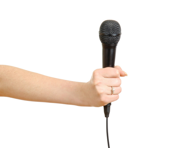 Black microphone in the hand - Foto, afbeelding