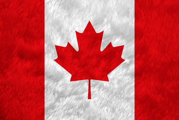 Флаг из ткани для полотенец, складки на фоне канадского флага, вертикальная повязка из красного и белого цветов с красным кленовым листом. - Фото, изображение