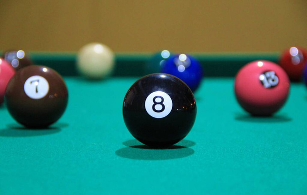 Closeup view of billiard balls on a playing table - Photo, Image
