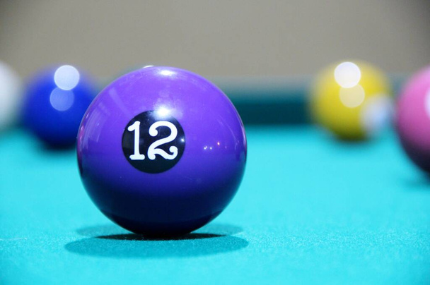 Closeup view of billiard balls on a playing table - Photo, Image