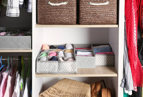 Modern wardrobe with clean clothes - Photo, Image