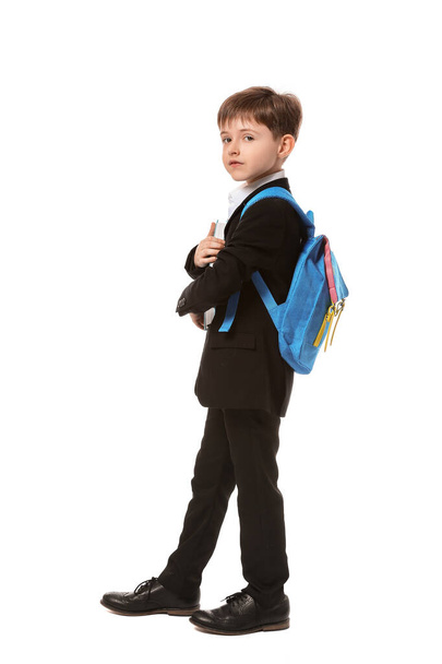Little schoolboy on white background - Valokuva, kuva
