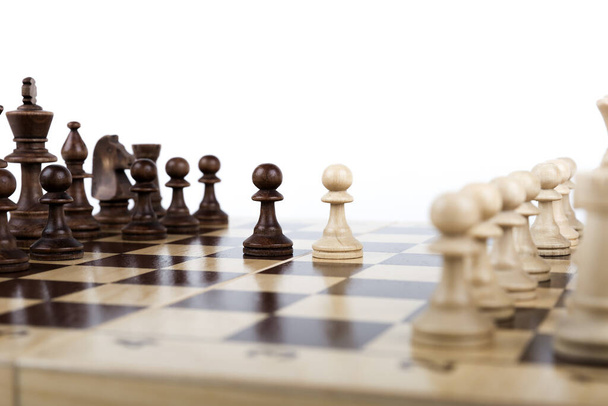 chessboard and chess pieces on white background close up - Foto, imagen