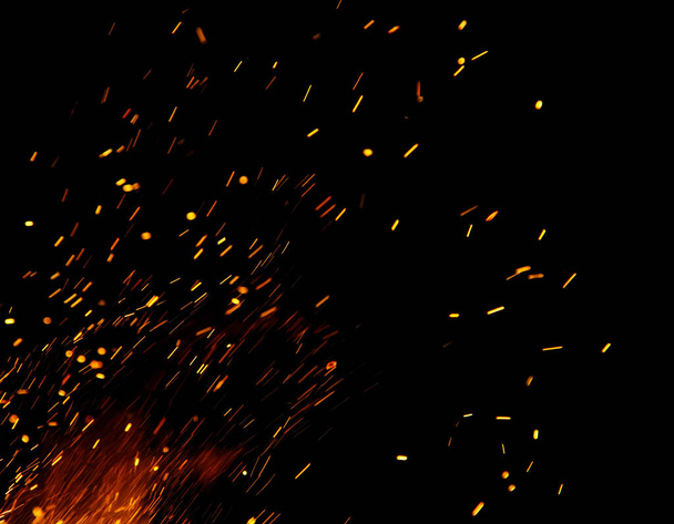 φωτιά φλόγες με σπινθήρες σε μαύρο φόντο - Φωτογραφία, εικόνα