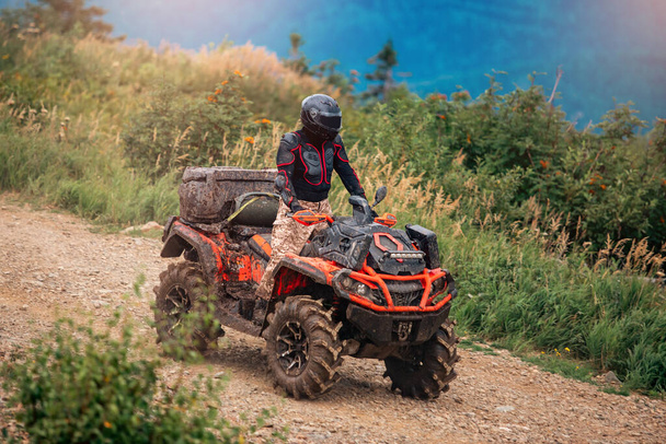ATV bike rides through forest off-road in trip summer - Photo, Image