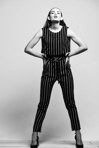 Pretty girl in striped suit - Valokuva, kuva
